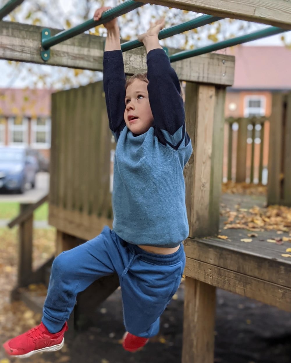 A junior on the monkey bars